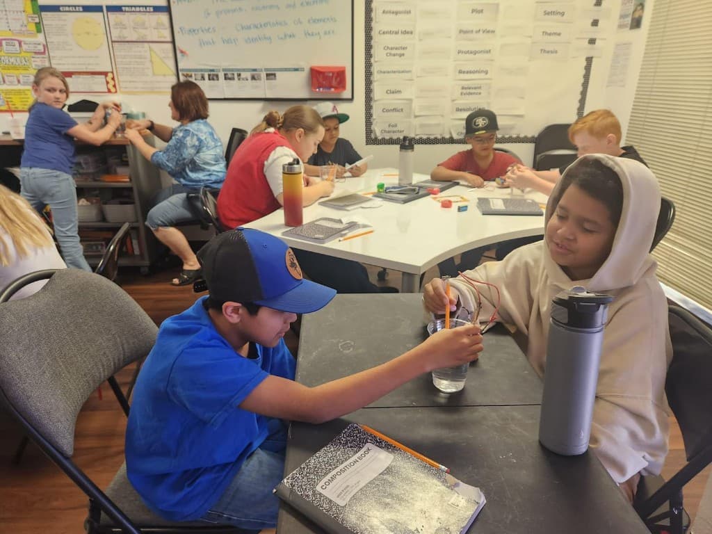 Students doing a hands-on sensory activity at Community Schoolhouse.